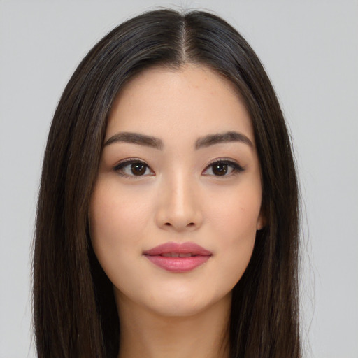 Neutral asian young-adult female with long  brown hair and brown eyes