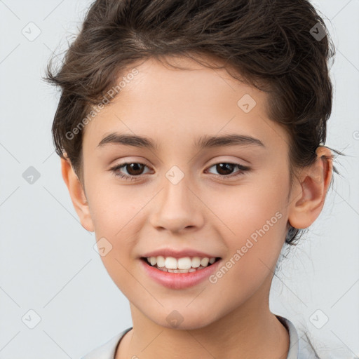 Joyful white child female with short  brown hair and brown eyes