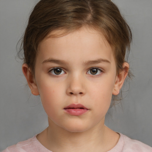 Neutral white child female with medium  brown hair and brown eyes