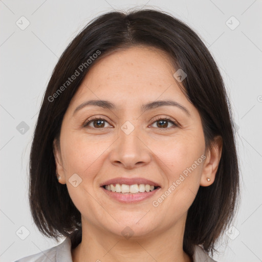 Joyful white adult female with medium  brown hair and brown eyes