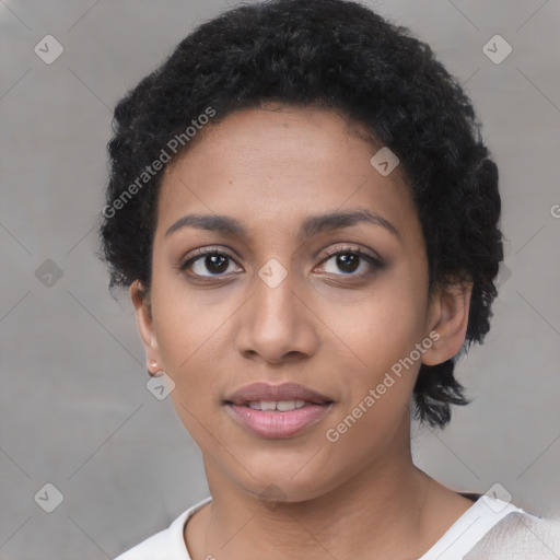 Joyful latino young-adult female with short  black hair and brown eyes