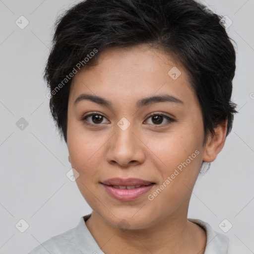 Joyful asian young-adult female with short  brown hair and brown eyes