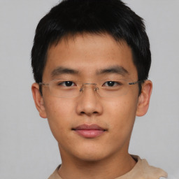 Neutral asian young-adult male with short  brown hair and brown eyes