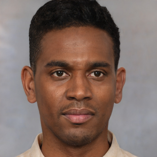 Neutral latino young-adult male with short  brown hair and brown eyes
