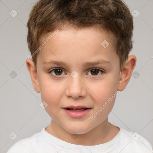 Joyful white child male with short  brown hair and brown eyes