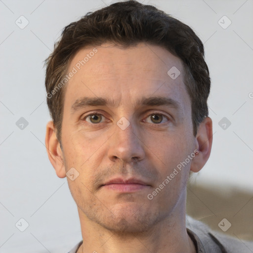 Neutral white adult male with short  brown hair and brown eyes