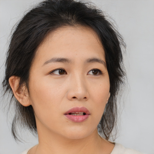 Neutral asian young-adult female with medium  brown hair and brown eyes