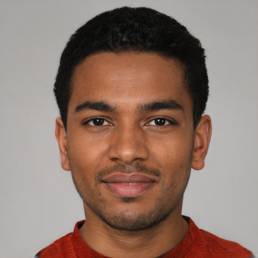 Neutral black young-adult male with short  black hair and brown eyes