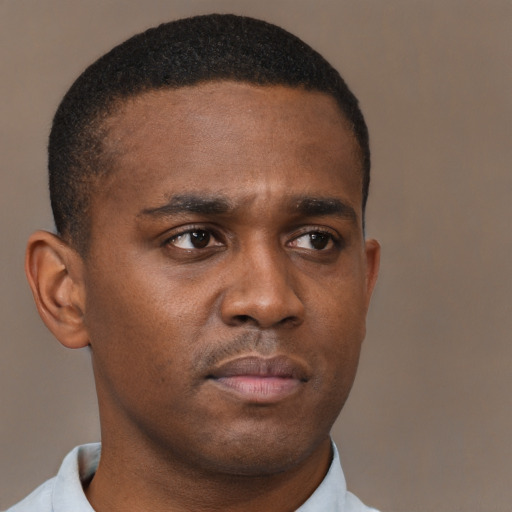 Neutral black young-adult male with short  brown hair and brown eyes