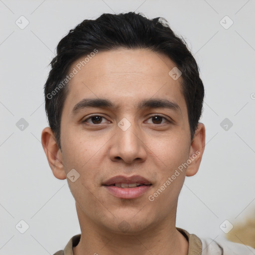 Joyful white young-adult male with short  black hair and brown eyes