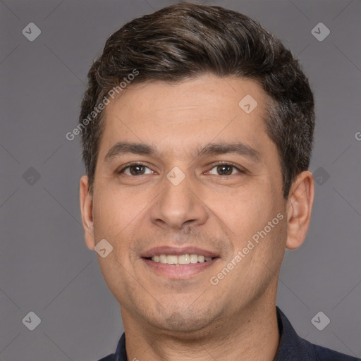 Joyful white adult male with short  brown hair and brown eyes