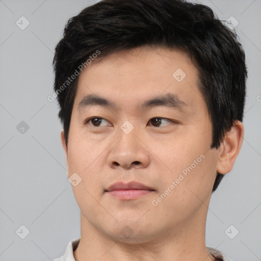 Neutral asian young-adult male with short  black hair and brown eyes