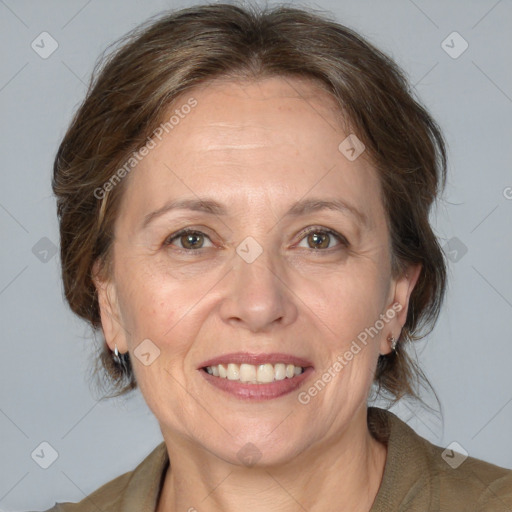 Joyful white adult female with medium  brown hair and grey eyes