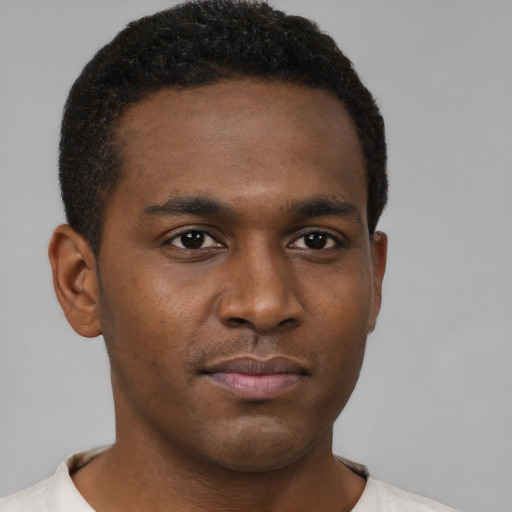 Neutral black young-adult male with short  brown hair and brown eyes