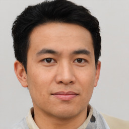 Neutral asian adult male with short  black hair and brown eyes