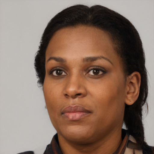 Neutral black young-adult female with short  black hair and brown eyes
