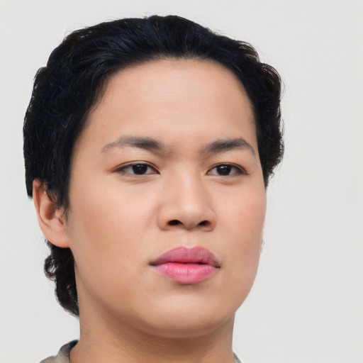 Joyful asian young-adult female with short  black hair and brown eyes