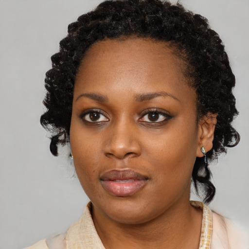 Neutral black young-adult female with short  black hair and brown eyes