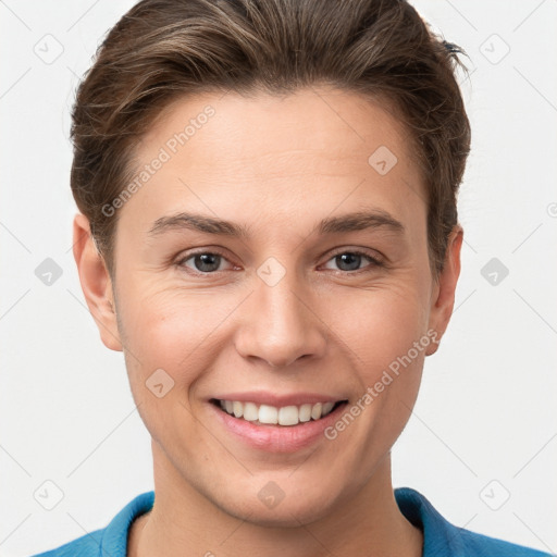 Joyful white young-adult female with short  brown hair and grey eyes