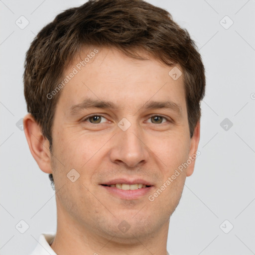 Joyful white adult male with short  brown hair and brown eyes