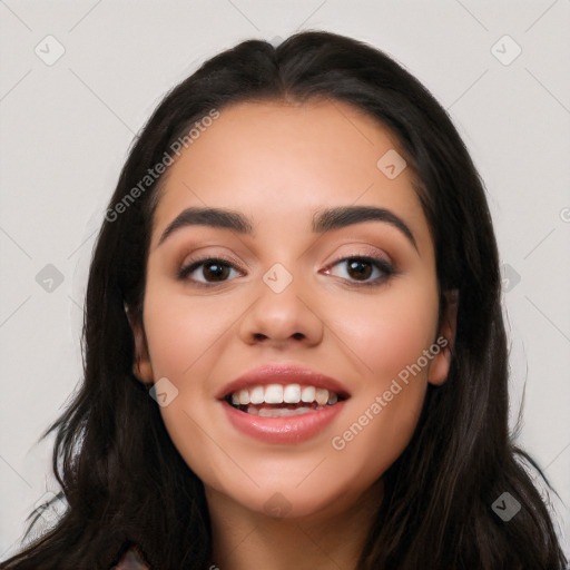 Joyful latino young-adult female with long  black hair and brown eyes