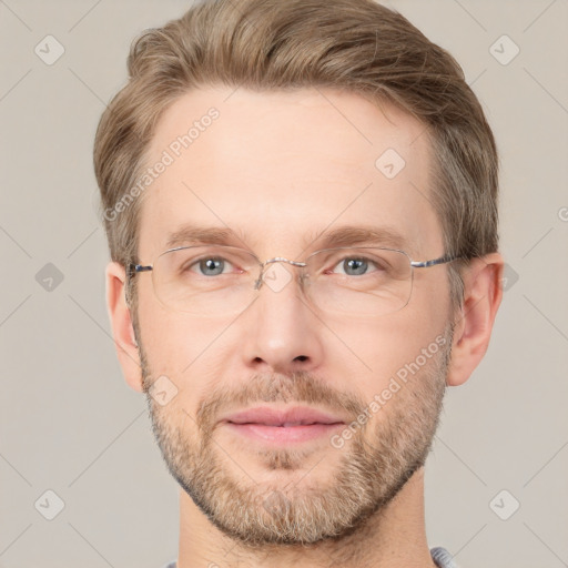 Joyful white adult male with short  brown hair and grey eyes