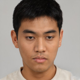 Neutral asian young-adult male with short  brown hair and brown eyes