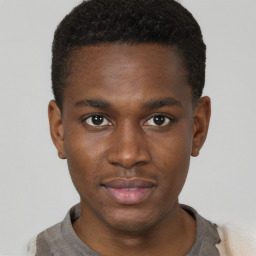 Neutral black young-adult male with short  brown hair and brown eyes