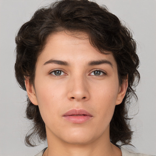 Neutral white young-adult female with medium  brown hair and brown eyes