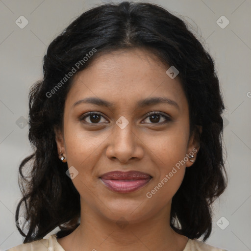 Joyful black young-adult female with medium  brown hair and brown eyes