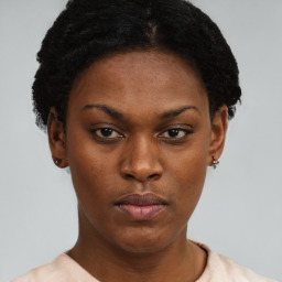 Neutral black young-adult female with short  black hair and brown eyes