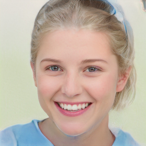 Joyful white young-adult female with short  brown hair and blue eyes