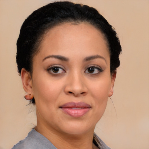 Joyful white young-adult female with short  black hair and brown eyes