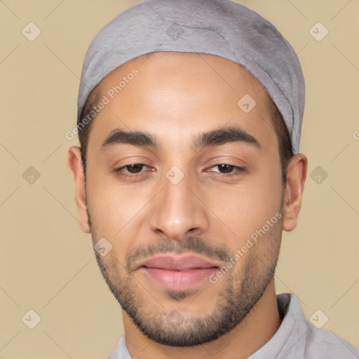 Joyful white young-adult male with short  black hair and brown eyes