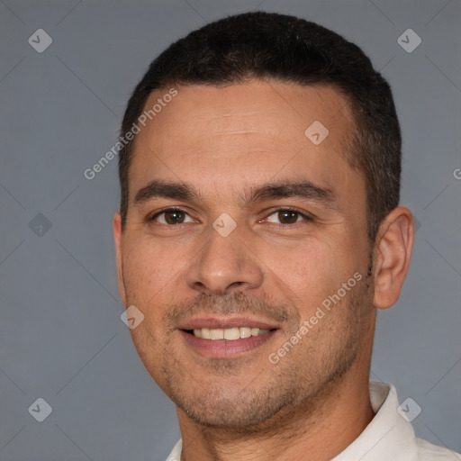 Joyful white young-adult male with short  brown hair and brown eyes