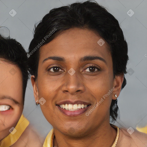 Joyful latino young-adult female with short  brown hair and brown eyes