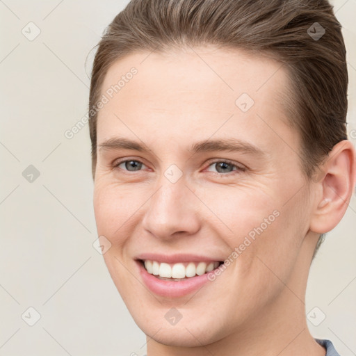 Joyful white young-adult female with short  brown hair and brown eyes