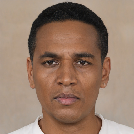 Neutral black young-adult male with short  black hair and brown eyes