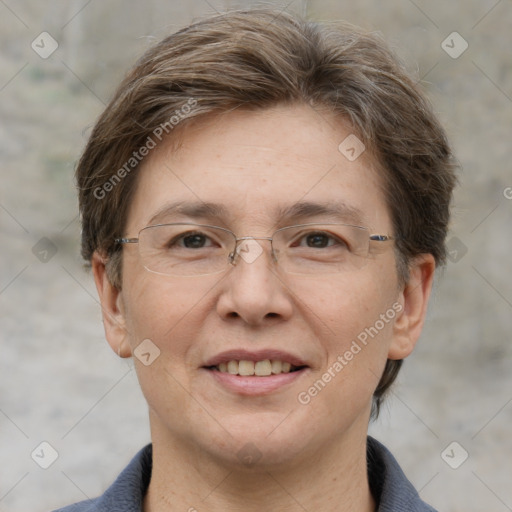 Joyful white adult female with short  brown hair and grey eyes