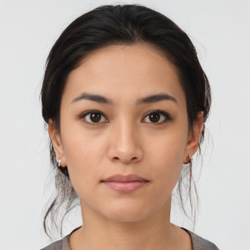 Neutral asian young-adult female with medium  black hair and brown eyes