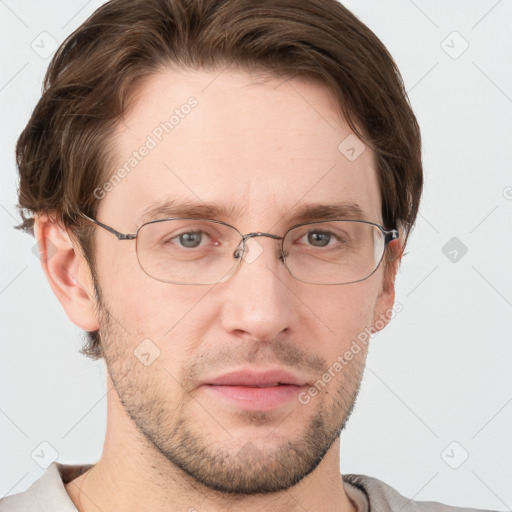 Joyful white adult male with short  brown hair and grey eyes