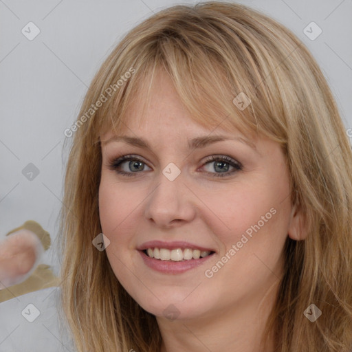 Joyful white young-adult female with long  brown hair and grey eyes