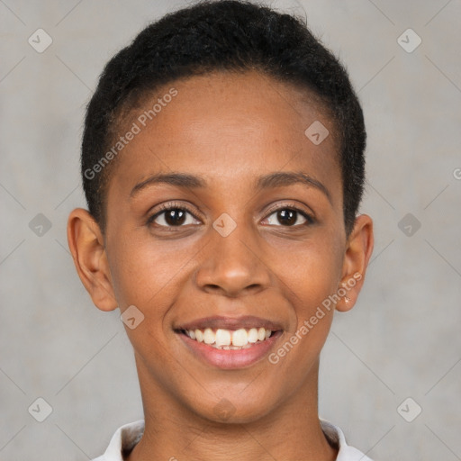 Joyful black young-adult female with short  brown hair and brown eyes