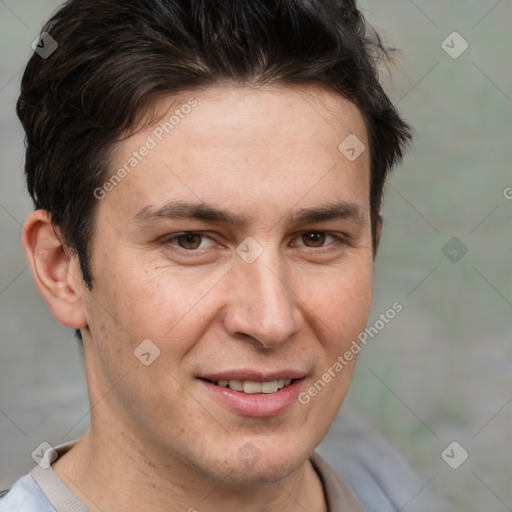 Joyful white adult male with short  brown hair and brown eyes