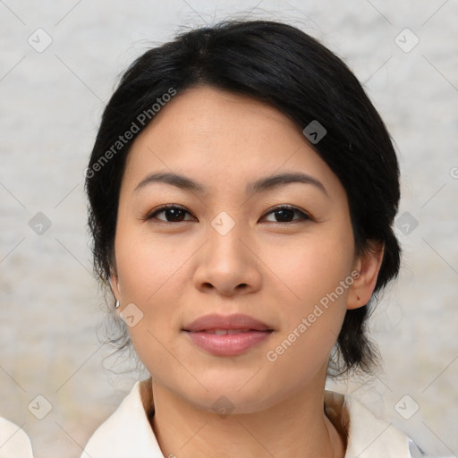 Joyful asian young-adult female with medium  black hair and brown eyes