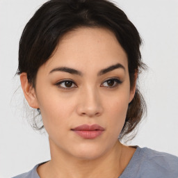 Neutral asian young-adult female with medium  brown hair and brown eyes