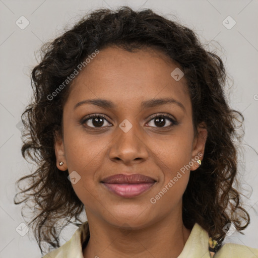 Joyful black young-adult female with medium  brown hair and brown eyes