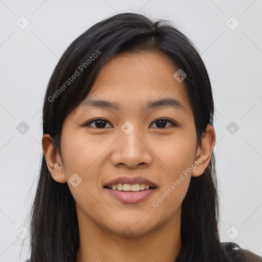 Joyful asian young-adult female with long  brown hair and brown eyes