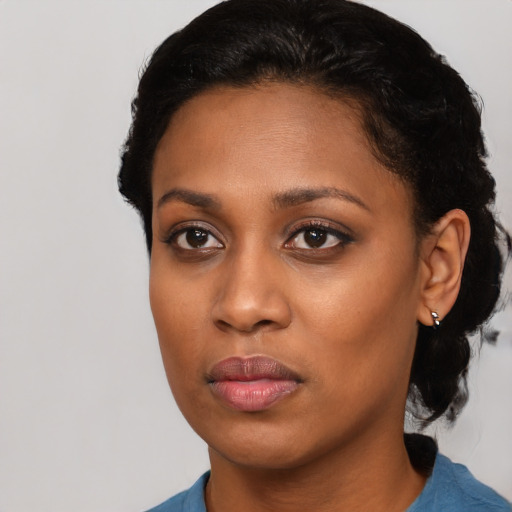 Neutral latino young-adult female with short  black hair and brown eyes
