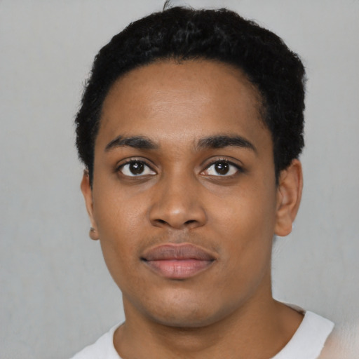 Neutral black young-adult male with short  black hair and brown eyes